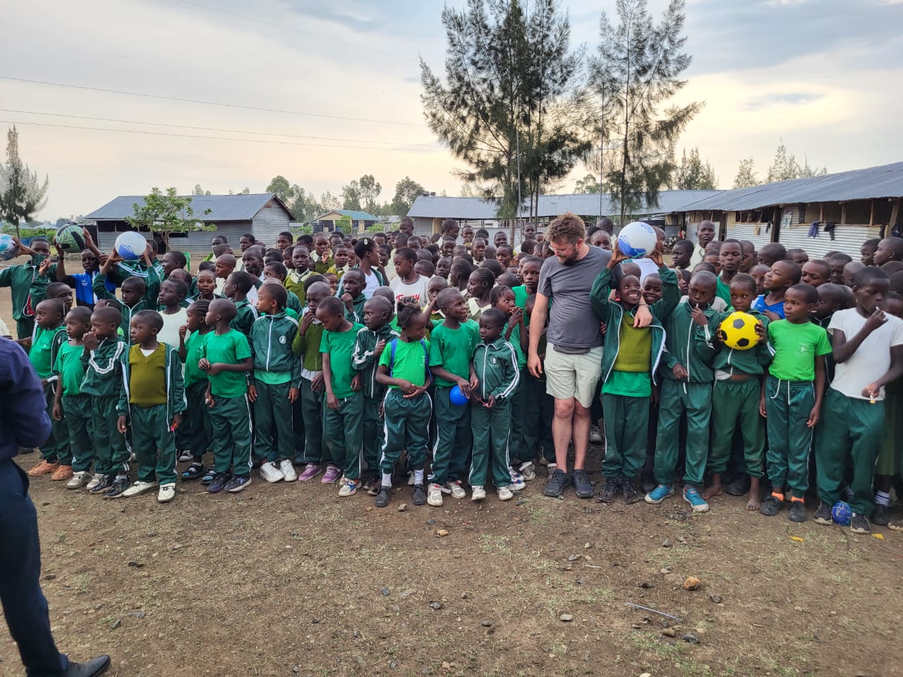 Happy Kenyan learners collaborating in class